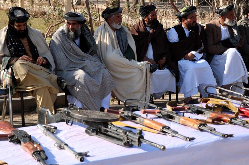 epa07311952 Former insurgents surrender their weapons during a reconciliation ceremony in Herat, Afghanistan, 23 January 2019. A group of twenty former insurgents on 23 January, laid down their arms in Herat and joined the peace process. Under an amnesty launched by former Afghan President Hamid Karzai and backed by the US in November 2004, hundreds of anti-government militants have surrendered to the government.  EPA/JALIL REZAYEE