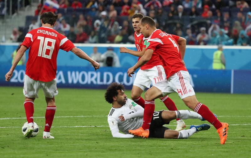 Mohamed Salah reacts after being fouled in the penalty area. Georgi Licovski / EPA