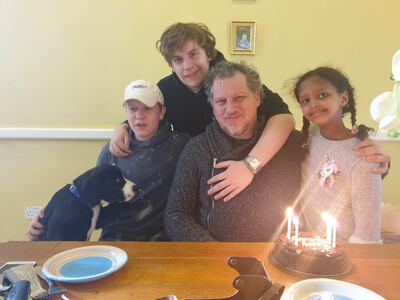 Robert Pether pictured with his three children before his detention in Iraq. Courtesy: Desree Pether