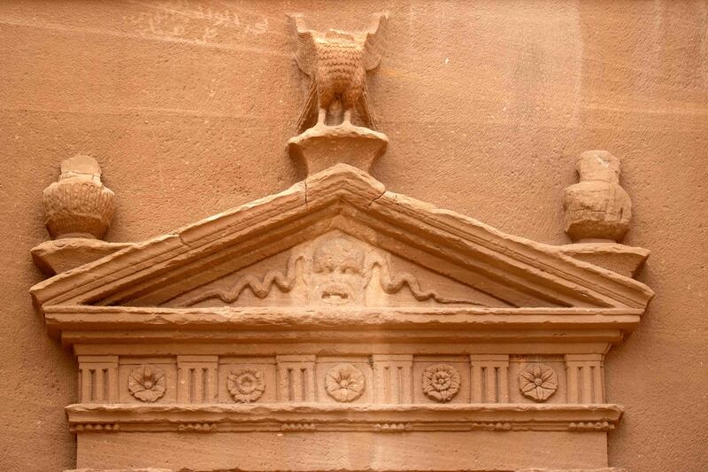 An ornately carved entrance at the site, which also has cave drawings and some pre-Nabataean inscriptions.