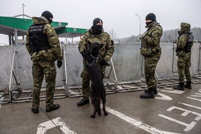 Polish Border Guard officers secure a closed crossing on the Polish-Belarusian border in Kuznica, eastern Poland. EPA