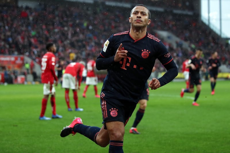 MAINZ, GERMANY - FEBRUARY 01: Thiago Alcantara of Muenchen celebrates his team's third goal during the Bundesliga match between 1. FSV Mainz 05 and FC Bayern Muenchen at Opel Arena on February 01, 2020 in Mainz, Germany. (Photo by Alex Grimm/Bongarts/Getty Images)