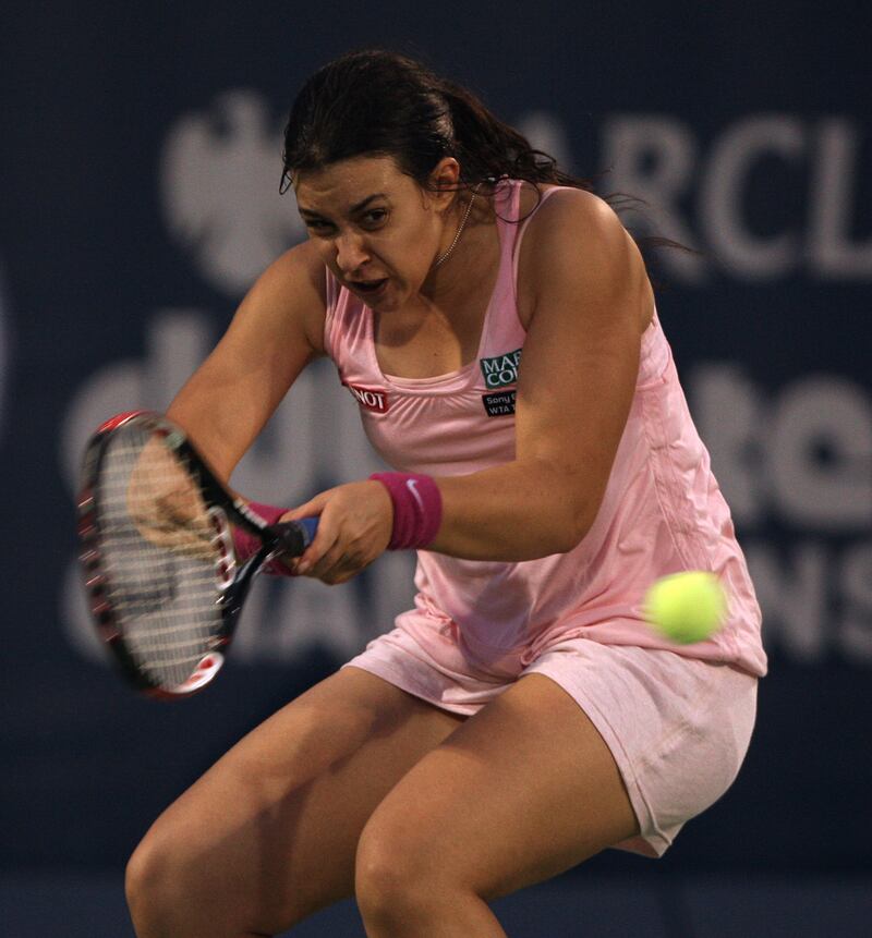 French girl Marion Bartoli in action on the second day of the Barclays Dubai Tennis Championship at Dubai Tennis Stadium in Dubai, United Arab Emirates, Tuesday, February 26,2008. { Photo by Paulo Vecina }