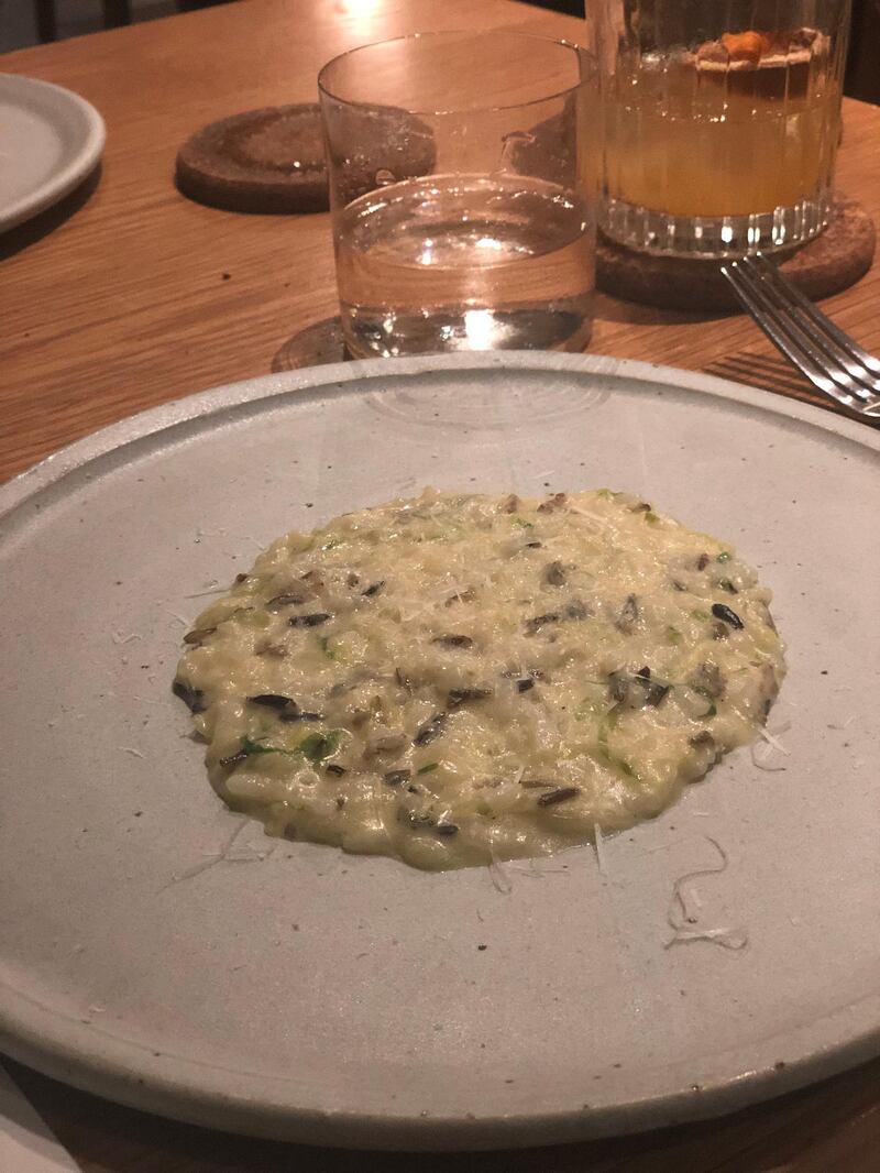 Braised lettuce risotto with wild rice and parmesan rinds at Lowe's Waste Not supper. Sophie Prideaux / The National 