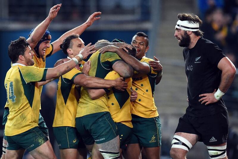 Australia players celebrate a try during their Rugby Championship win over New Zealand in August. Dean Lewins / EPA / August 8, 2015