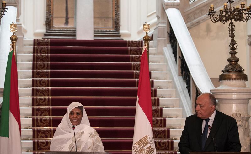 Egyptian Foreign Minister Sameh Shoukry and his Sudanese counterpart Maryam al-Sadiq al-Mahdi give a joint press conference after their meeting at the Tahrir Palace in Cairo. EPA