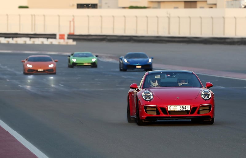 DUBAI, UNITED ARAB EMIRATES, August 31 – 2018 :- Members and Guests of the Ninth Degree supercars club driving their cars during the Ninth Degree supercars club meet held at Dubai Autodrome in Dubai. ( Pawan Singh / The National )  For Motoring. Story by Adam Workman