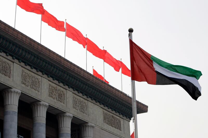 BEIJING, CHINA - August 14, 2009: The United Arab Emirates flag with the Chinese flag outside the Great Hall of the People in Beijing.
(Ryan Carter / The National)

*** stock, flag, china, chinese, uae *** Local Caption ***  RC014-ChinaStock.jpgBZ03DE_TradeChinaUAE.jpg