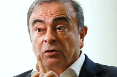 Former Nissan Chairman Carlos Ghosn speaks to Japanese media during an interview in Beirut.  AP
