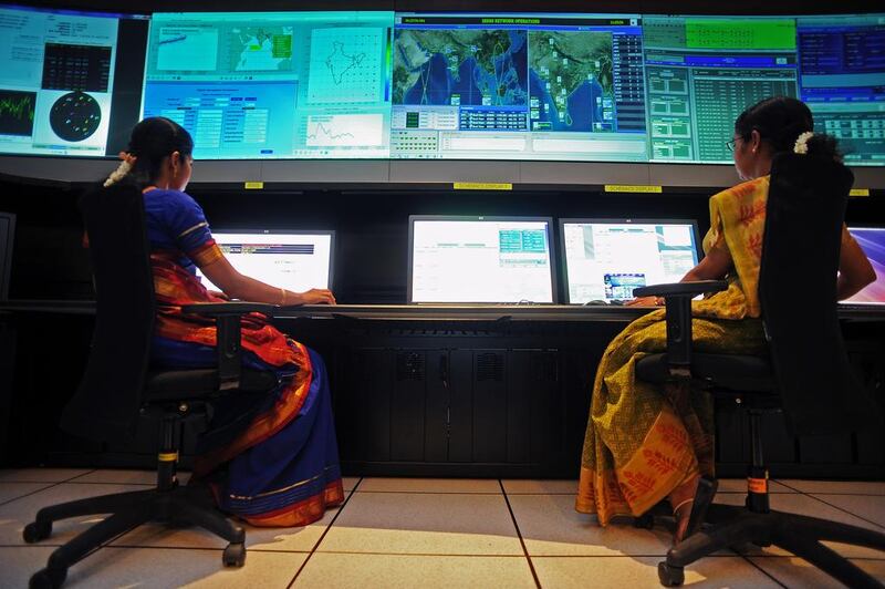 Scientists from the Indian Space Research Organisation (ISRO) work in the Indian Regional Navigational Satellite System (IRNSS) control room at the Indian Deep Space Network (IDSN), a network of large antennas and communication facilities that support India's interplanetary spacecraft missions, located at Byalalu village about 50 kms from Bangalore. Manjunath Kiran / AFP
