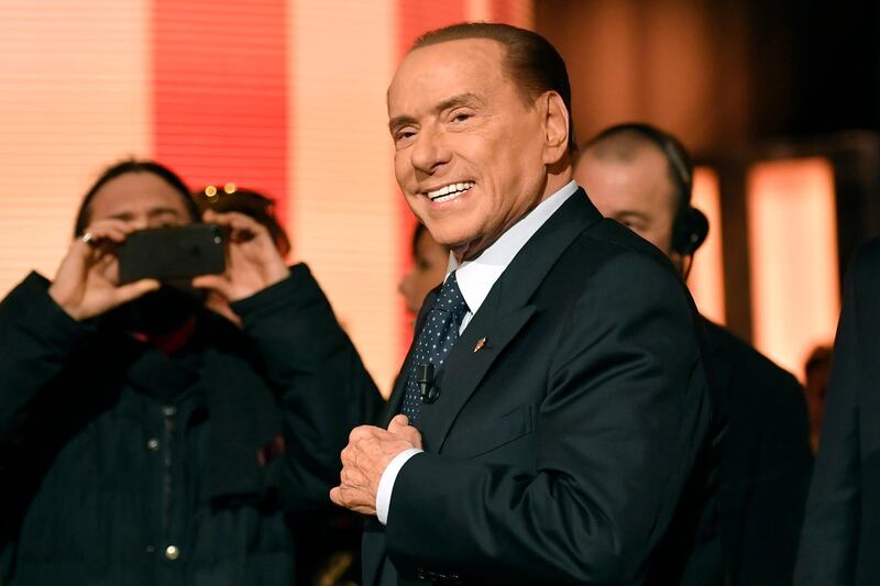 (FILES) In this file photo taken on January 18, 2018 in Rome Italian former Prime Minister and leader of center-right party Forza Italia (Go Italy), Silvio Berlusconi arriving to attend the TV show "Quinta Colonna", a programme of Italian channel Rete 4.
Berlusconi makes his political comeback ahead of the upcoming March general election, AFP reports on February 4, 2018. / AFP PHOTO / Andreas SOLARO