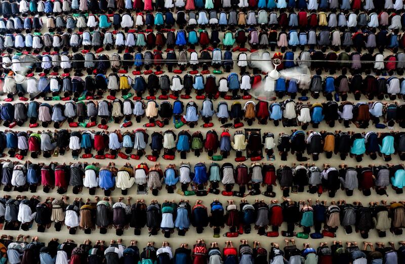 Hundreds of Indonesian students perform afternoon prayers on the first day of Ramadan at Ar-Raudhatul Hasanah Islamic boarding school in Medan, North Sumatra, Indonesia. .  EPA