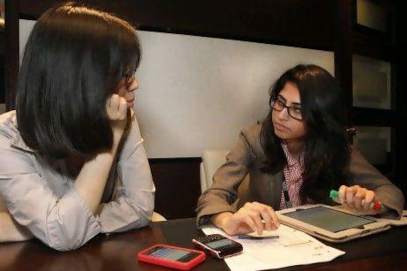 Iba Masood, co-founder and CEO of Gradberry (right), with Moylin Yuan, a student.