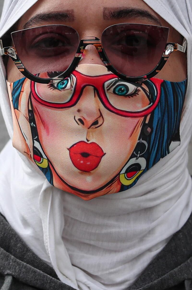 A woman wears a face mask in Istanbul, Turkey.  EPA