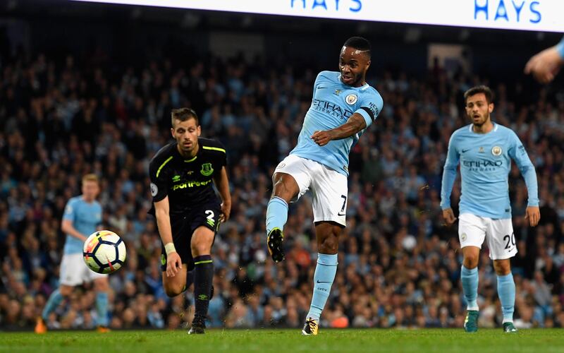 MANCHESTER, ENGLAND - AUGUST 21:  Raheem Sterling of Manchester City scores his sides first goal  during the Premier League match between Manchester City and Everton at Etihad Stadium on August 21, 2017 in Manchester, England.  (Photo by Stu Forster/Getty Images)