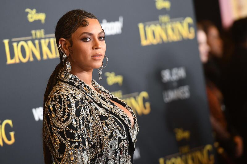 (FILES) In this file photo US singer/songwriter Beyonce arrives for the world premiere of Disney's "The Lion King" at the Dolby theatre on July 9, 2019 in Hollywood. Beyonce on June 7 delivered a message to the graduating Class of 2020, marking their achievement with a speech amplifying messages of the Black Lives Matter movement and praising change-makers. / AFP / Robyn Beck

