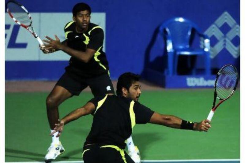 Rohan Bopanna, left, and Asiam-ul-Haq Qureshi have become a formidable doubles team. Dibyangshu Sarkar / AFP