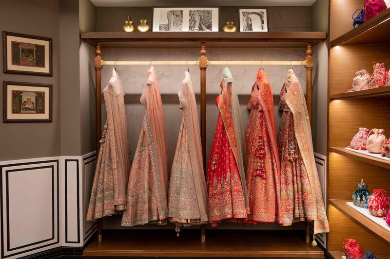In this photo taken on February 14, 2020, bridal dresses and accessories of fashion designer Anita Dongre are displayed at her store in Mumbai. With stores in India and New York, multiple clothing brands and a global celebrity following, fashion designer Anita Dongre is a feminist powerhouse in a male-dominated industry. But her true ambition is to create an environmentally sustainable company, she says. - TO GO WITH Women-activism-India-fashion-economy-environment,INTERVIEW by Ammu Kannampilly
 / AFP / Laurène Becquart / TO GO WITH Women-activism-India-fashion-economy-environment,INTERVIEW by Ammu Kannampilly
