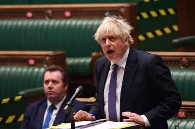 A handout photograph released by the UK Parliament shows Britain's Prime Minister Boris Johnson presenting the Prime Minister's statement on Covid-19 in the House of Commons in London on January 6, 2021.  - RESTRICTED TO EDITORIAL USE - MANDATORY CREDIT " AFP PHOTO / UK PARLIAMENT / JESSICA TAYLOR " - NO USE FOR ENTERTAINMENT, SATIRICAL, MARKETING OR ADVERTISING CAMPAIGNS - EDITORS NOTE THE IMAGE HAS BEEN DIGITALLY ALTERED AT SOURCE TO OBSCURE VISIBLE DOCUMENTS
 / AFP / UK PARLIAMENT / JESSICA TAYLOR / RESTRICTED TO EDITORIAL USE - MANDATORY CREDIT " AFP PHOTO / UK PARLIAMENT / JESSICA TAYLOR " - NO USE FOR ENTERTAINMENT, SATIRICAL, MARKETING OR ADVERTISING CAMPAIGNS - EDITORS NOTE THE IMAGE HAS BEEN DIGITALLY ALTERED AT SOURCE TO OBSCURE VISIBLE DOCUMENTS
