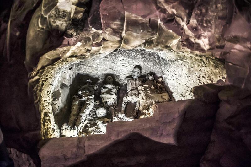 A group of mummies are stacked together at the site. AFP