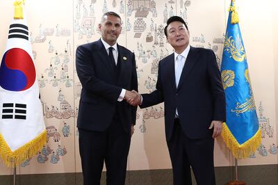 Khaldoon Al Mubarak meets South Korean President Yoon Suk Yeol in Seoul in May. Getty Images