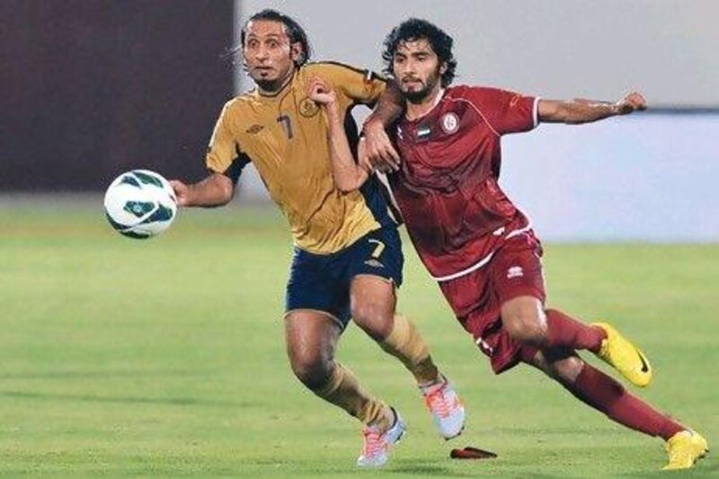 Richard Porta, left, played a hand in both the goals for Dubai at Al Wahda.