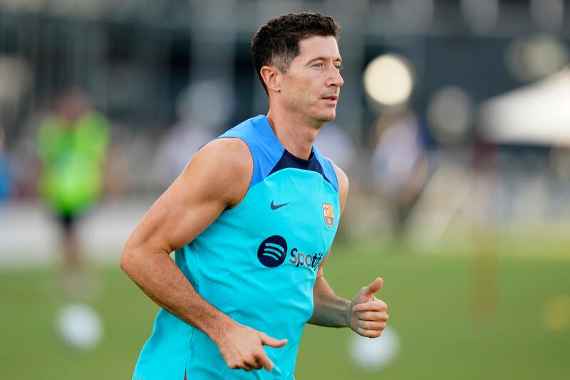 Robert Lewandowski warms up with Barcelona teammates on Tuesday, July 19, 2022, for the friendly against Inter Miami in Fort Lauderdale, Florida. AP