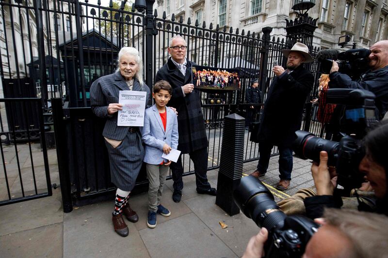 Westwood with her son Joe Corre, right, and Oliver Simpson, nine, protesting against fracking. AFP