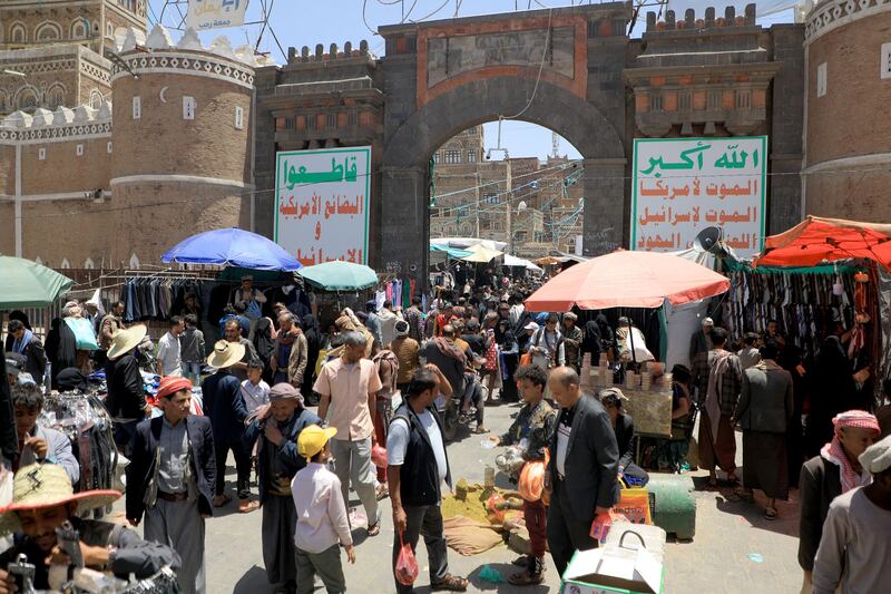 Yemenis shop in Sanaa before the festival. AFP