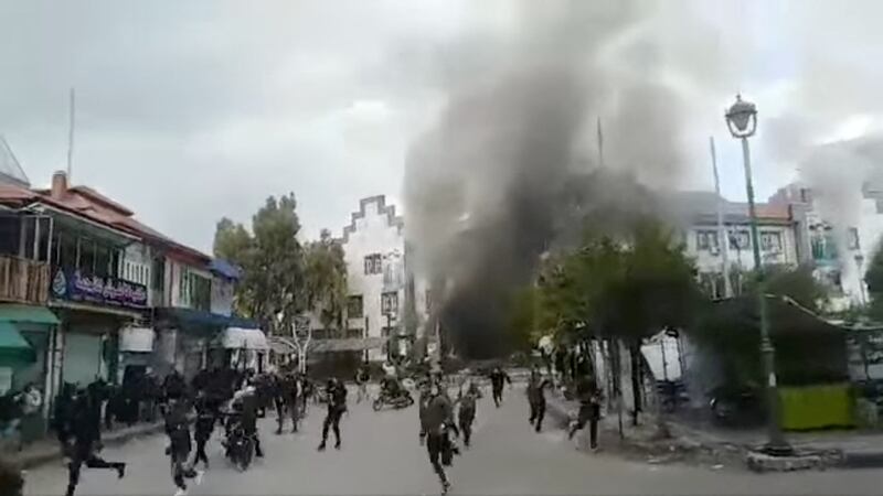 People in Sweida clash with the security forces. Reuters