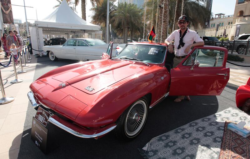 Dubai, United Arab Emirates - March 9, 2013.  Haseb Zada from Afghanistan with his classic car a 1966 Chevrolet Corvette Stingray, at the 5th Emirates Classic Car Festival.  ( Jeffrey E Biteng / The National )