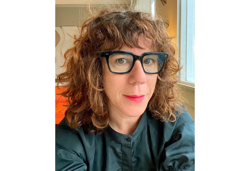 This image released by Ecco/HarperCollins shows author Jami Attenberg, founder of the 1,000 word challenge, calling for people to write 1,000 words a day for 14 days. The 2021 challenge began May 31 and ends Sunday. (Jami Attenberg via AP)