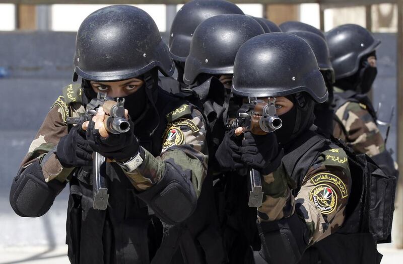 The women performed their drills at the walled Presidential Guards training complex in Jericho. Ammar Awad / Reuters
