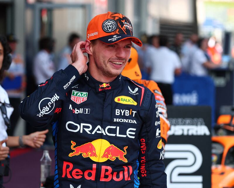 Red Bull's Max Verstappen reacts after clinching pole position. Reuters