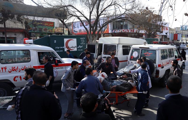 epa06478145 Afghan medics carry people injured in a bomb explosion for medical treatment to a hospital in Kabul, Afghanistan, 27 January 2018. A huge explosion rocked Kabul on 27 January, killing at least 40 people and injuring several dozens.  EPA/JAWAD JALALI