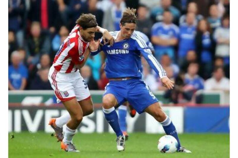 Jonathan Woodgate was stellar in the defence to block the efforts of Fernando Torres and Chelsea. Clive Brunskill / Getty Images