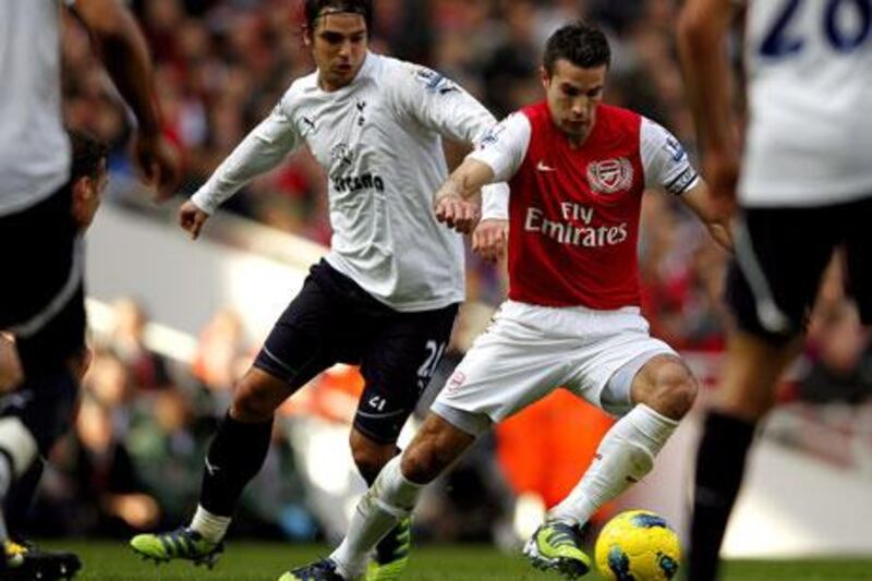 Robin van Persie, right, in action scored for Arsenal on Sunday.