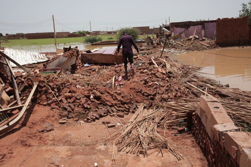 A house damaged by heavy rainfall in the village of Aboud. AP 