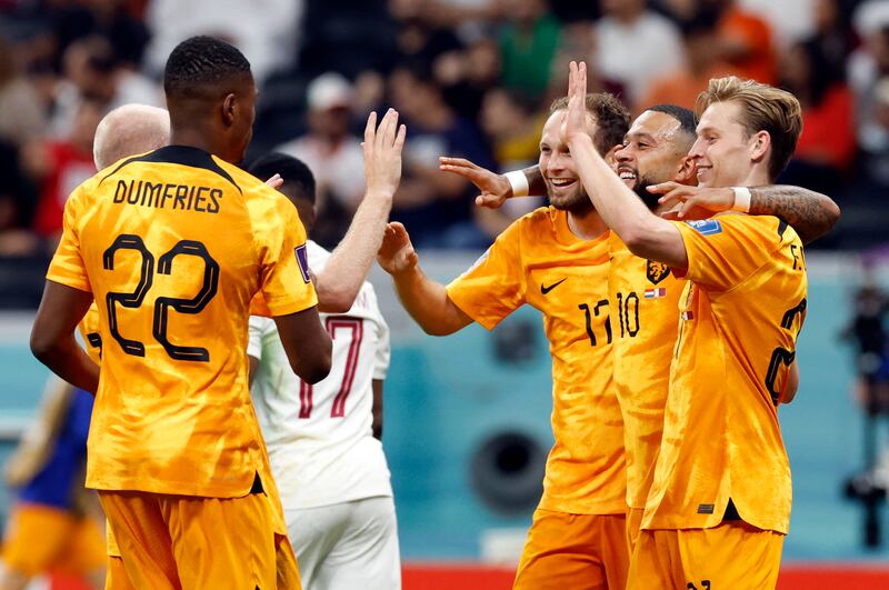 Netherlands' Frenkie de Jong celebrates scoring with Memphis Depay, Denzel Dumfries and Daley Blind. Reuters