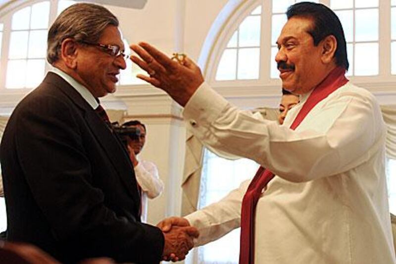 SM Krishna, the Indian external affairs minister, left, greets Sri Lanka President Mahinda Rajapaksa during his visit last week.