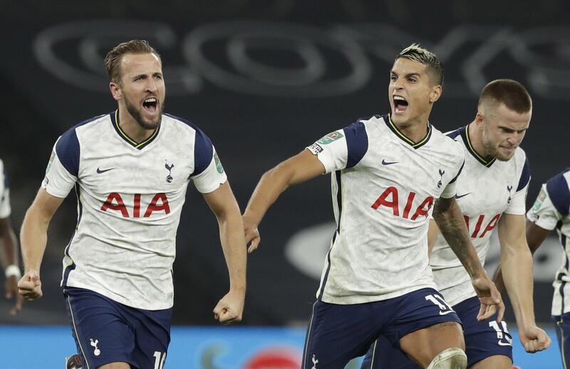 epa08706843 Harry Kane (L) and Erik Lamela (C) of Tottenham celebrate after winning on penalties against Chelsea during the English Carabao Cup 4th round match between Tottenham Hotspur and Chelsea in London, Britain, 29 September 2020.  EPA/Matt Dunham / POOL EDITORIAL USE ONLY. No use with unauthorized audio, video, data, fixture lists, club/league logos or 'live' services. Online in-match use limited to 120 images, no video emulation. No use in betting, games or single club/league/player publications.