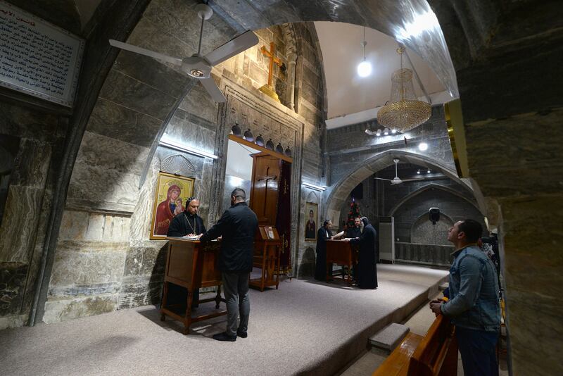 People pray at the monastery, which today is also the centre of an archbishopric