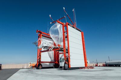 This Wednesday, Oct. 18, 2017 photo provided by Project Loon shows a stratospheric balloon being prepared for launch from the project site in Winnemucca, Nev. Google's parent Alphabet Inc. said Friday that its stratospheric balloons are now delivering the internet to remote areas of Puerto Rico where cellphone towers were knocked out by Hurricane Maria. Two of the search giant's "Project Loon" balloons are already over the country enabling texts, emails and basic web access to AT&T customers with handsets that use its 4G LTE network.  (Project Loon via AP)