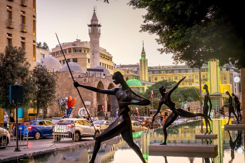 2A3YD31 `The warriors sculptures by Antonio Signorini, in Samir Kassir garden or square, in background Waygand street, Downtown, Beirut, Lebanon