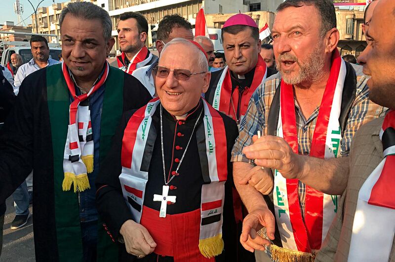 Cardinal Louis Raphael I Sako, patriarch of the Chaldean Catholic Church, visits Tahrir Square in Baghdad. AP