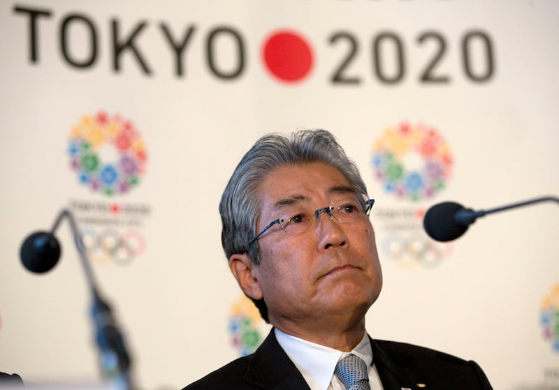 FILE - This is a Thursday, Jan. 10, 2013 file photo of Tsunekazu Takeda, President of the Tokyo 2020 Olympic games bid, as he listens to a question from the media during their first international presentation of the Tokyo 2020 Olympic Games bid in London. France's financial crimes office says International Olympic Committee member Takeda is being investigated for corruption related to the 2020 Tokyo Olympics. The National Financial Prosecutors office says Takeda, the president of the Japanese Olympic Committee, was placed under formal investigation for "active corruption" on Dec. 10.(AP Photo/Alastair Grant, File)