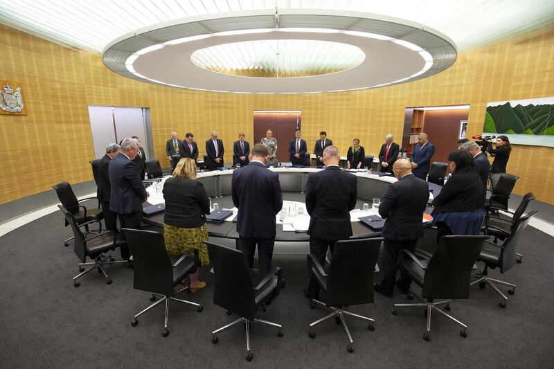 Members of the Cabinet observe a minute of silence for victims of the White Island tragedy during a cabinet meeting in Wellington, New Zealand.  EPA