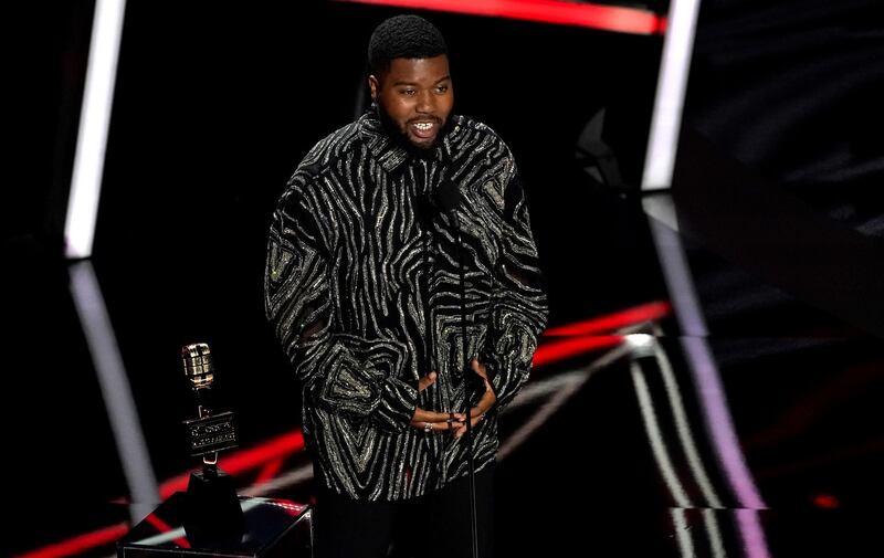 Khalid accepts the award for top R&B artist at the Billboard Music Awards. AP