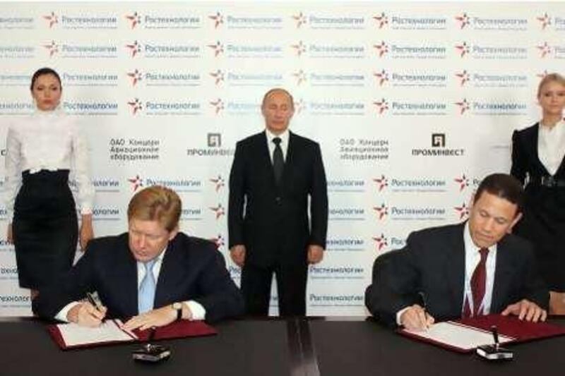 Mr Mikhail Shelkov , CEO of Prominvest, left,  and Mr Badr Jafar, Executive Director of the Crescent Group and Vice Chairman of Gulftainer, right. Behind them stands Russian Prime Minister Vladimir Putin.

Courtesy of SAHARA Communications