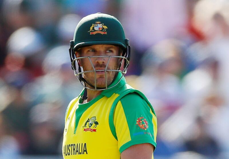 Cricket - ICC Cricket World Cup - Australia v South Africa - Old Trafford, Manchester, Britain - July 6, 2019   Australia's Aaron Finch walks after losing his wicket      Action Images via Reuters/Jason Cairnduff